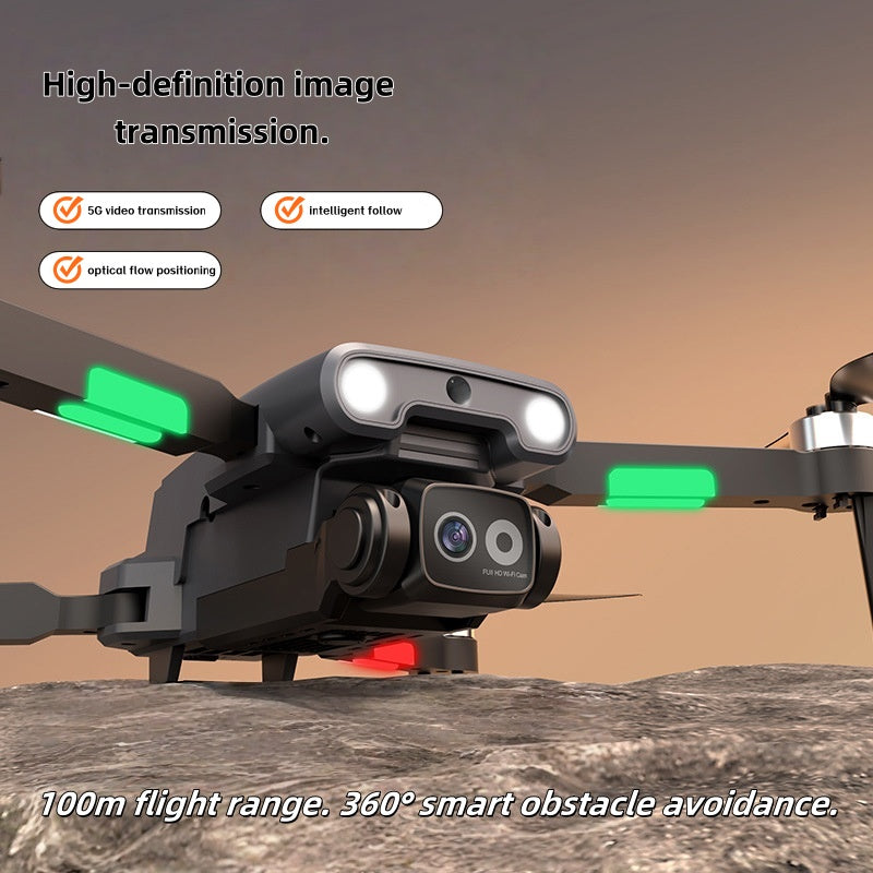 Foldable 4-axis RC drone with LED lights flying in outdoor sky