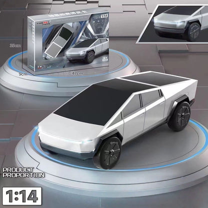 Close-up_of_grey_Cybertruck_RC_car_chassis_and_remote_controller-0-cib